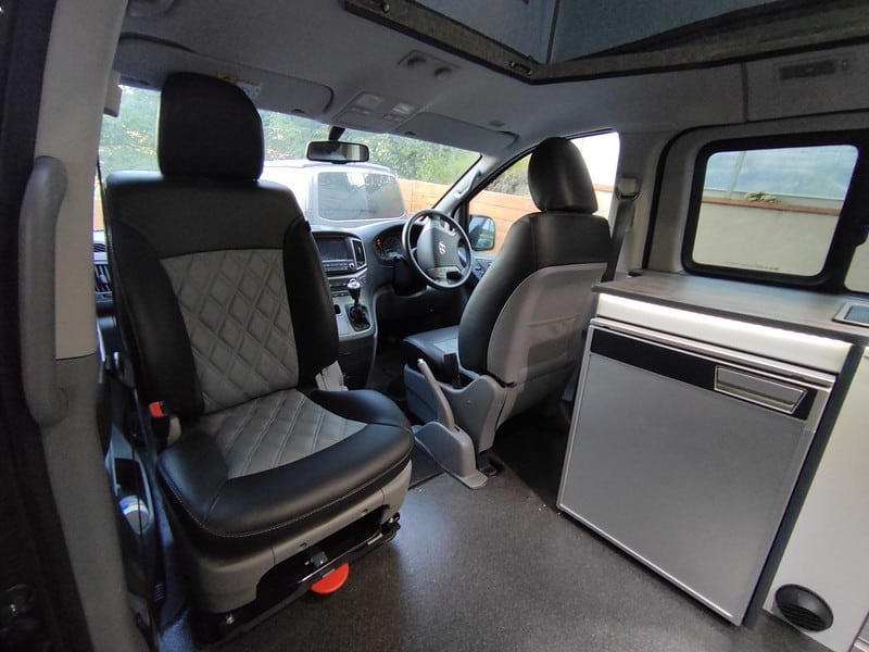 Camper van kitchen unit with diesel heater installed